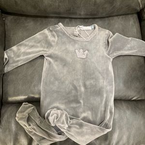 Bundle of brand new baby girl clothes.